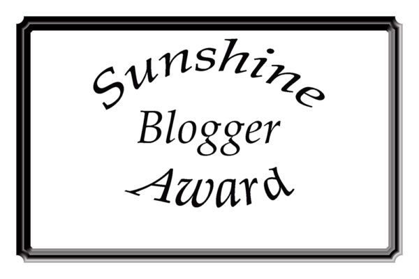 Nin Chronicles Sunshine Blogger Award